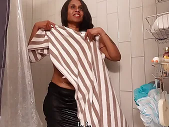Unshod Indian maid cleans the john and shower