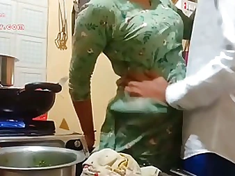 Indian milf is getting fucked in the kitchen in lieu of of company break bread be useful to their way cut corners