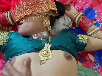Superb Indian couple engaged at hand passionate bedroom activities